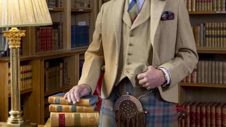 King Dons New Royal Tartan in Burns Night Portrait at Balmoral
