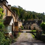 a stone path leading to a house